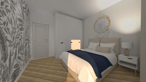 biała sypialnia z łóżkiem i lustrem w obiekcie Przystanek Morze w Gdańsku