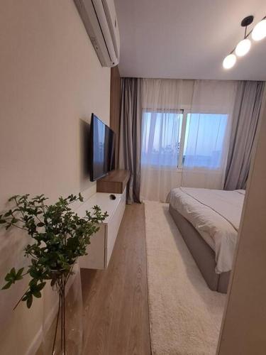 Ένα ή περισσότερα κρεβάτια σε δωμάτιο στο Luxury in the heart of Gouna