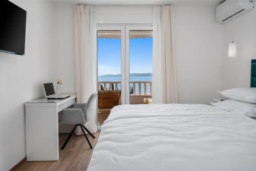 Ένα ή περισσότερα κρεβάτια σε δωμάτιο στο Apartmani Marko