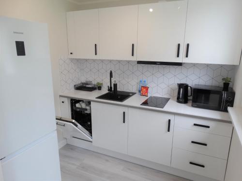 Η κουζίνα ή μικρή κουζίνα στο Apartament centrum Świnoujście 1