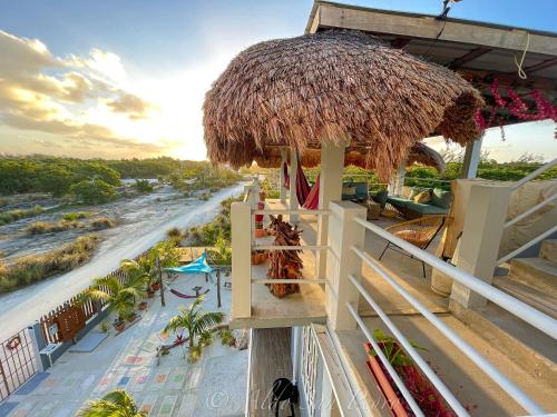 a view of a resort with a view of a beach at Costa Nube in Caye Caulker