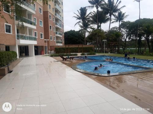 Bazén v ubytování Apartamento 2 quartos novinho vista total Lagoa Maraponga nebo v jeho okolí