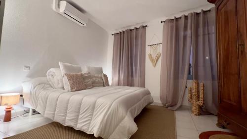 Posteľ alebo postele v izbe v ubytovaní Duplex terrasse, Collioure
