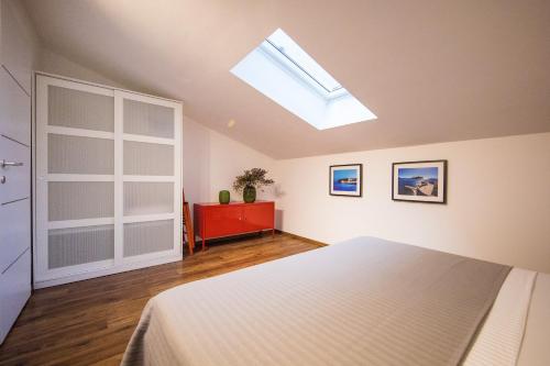 Llit o llits en una habitació de Piccola apartments - 50m from beach