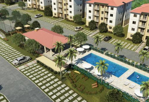 - une vue aérienne sur un complexe avec une piscine dans l'établissement Apartamento Ideal Flores, à Manaus