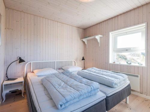 Postel nebo postele na pokoji v ubytování Holiday home Fanø CLXXIX