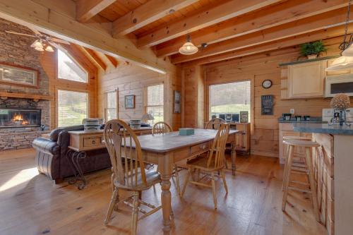 a kitchen and dining room with a table and chairs at Spring View in Sevierville