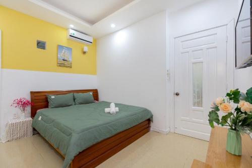 Postel nebo postele na pokoji v ubytování Nice Apartment Vũng Tàu OASKY