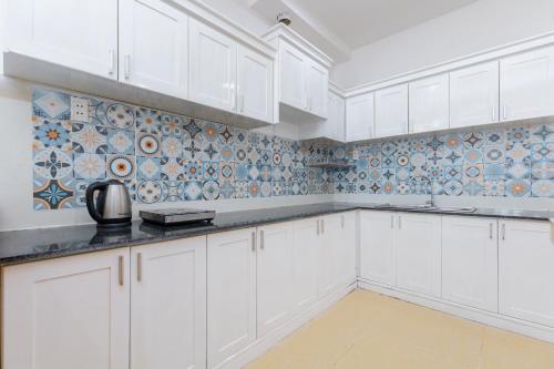 Kuchyň nebo kuchyňský kout v ubytování Nice Apartment Vũng Tàu OASKY