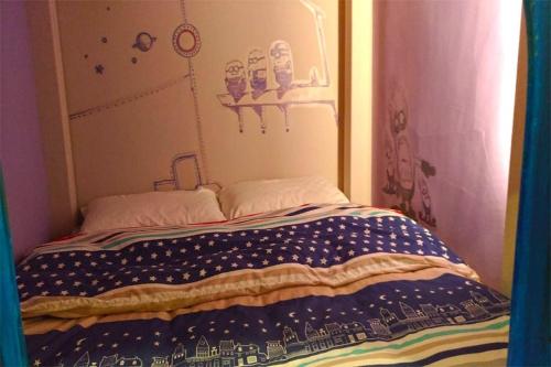 Postel nebo postele na pokoji v ubytování Star Moon Forest Inn