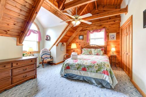 a bedroom with a bed and a wooden ceiling at Cherished Memories, 2 Bedrooms, Sleeps 6, Jetted Tub, Near Golf Course in Gatlinburg