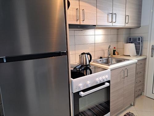 Cuisine ou kitchenette dans l'établissement Almyra seaside