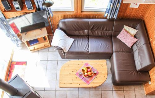 an overhead view of a living room with a couch and a table at 3 Bedroom Cozy Home In Extertal in Extertal
