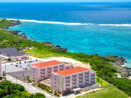an aerial view of a hotel and the ocean at Hot Cross Point Santa Monica in Miyako Island