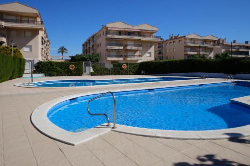 AT058 Comunidad con 2 piscinas, a 5 min a pie de la playa