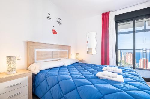 Postel nebo postele na pokoji v ubytování Mirador Mediterraneo 15-E Apartment Levante Beach