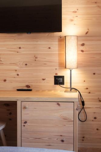 TV a/nebo společenská místnost v ubytování Hotel Piccola Baita