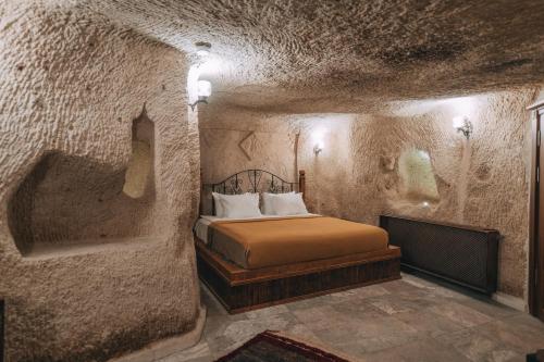 Cama ou camas em um quarto em Sora Cave Hotel
