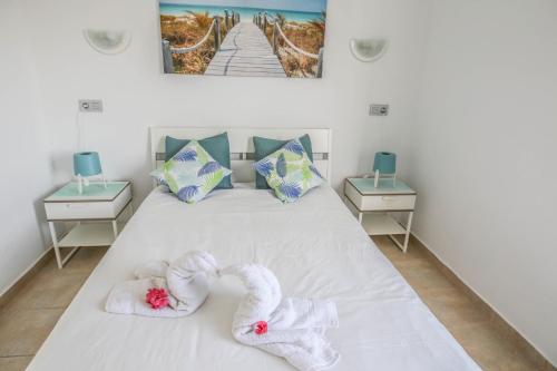 Postel nebo postele na pokoji v ubytování Suite cosy relax a 400m de la playa