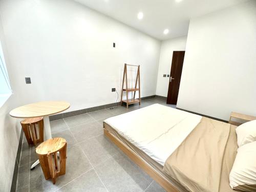 Ένα ή περισσότερα κρεβάτια σε δωμάτιο στο Mỡ Villa Cao Bằng