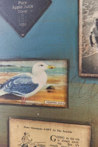 a picture of a bird on a wall with pictures at Hotel Du Vin Poole in Poole