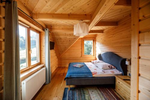 Tempat tidur dalam kamar di Kocierska Chata