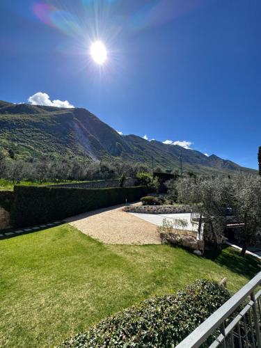 a view from the balcony of a house with a mountain at Appartamento Campiano B in Malcesine