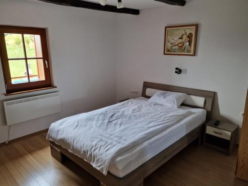 Postel nebo postele na pokoji v ubytování Vacation House Donacka Gora