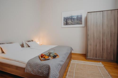 Ένα ή περισσότερα κρεβάτια σε δωμάτιο στο Apartamenty Bukowiec Folwark i Park