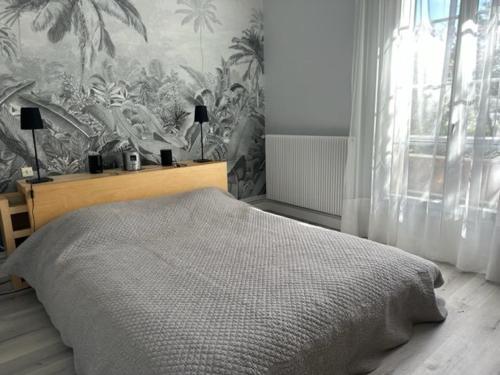 Posteľ alebo postele v izbe v ubytovaní Appartement Royan, 3 pièces, 6 personnes - FR-1-494-133