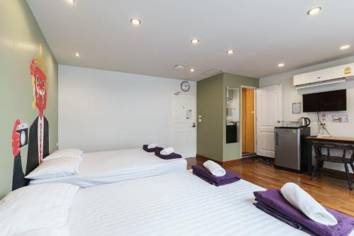Kuchyň nebo kuchyňský kout v ubytování 99 Hostel Khaosan