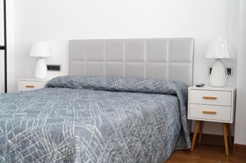 Postel nebo postele na pokoji v ubytování Ornis Apartments Poble
