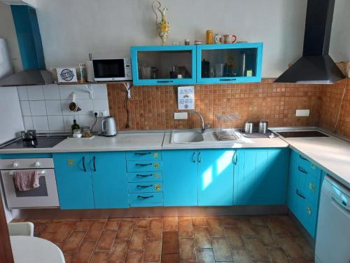 A kitchen or kitchenette at Puerto Nest Hostel