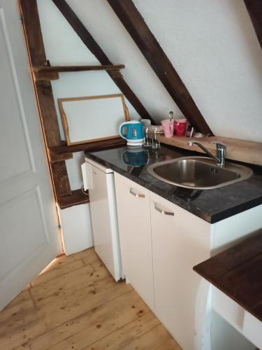 Kuchyň nebo kuchyňský kout v ubytování BUNGALOV COZY UNA