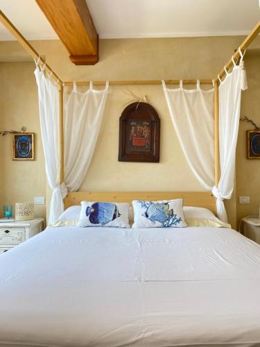 Ένα ή περισσότερα κρεβάτια σε δωμάτιο στο Villa Paradiso