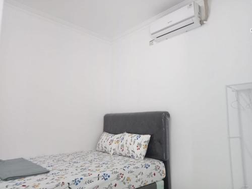 Кровать или кровати в номере KENARI P25 HOMESTAY Syariah