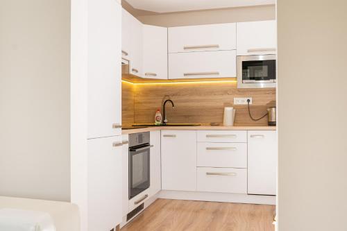A kitchen or kitchenette at Nice flat in city