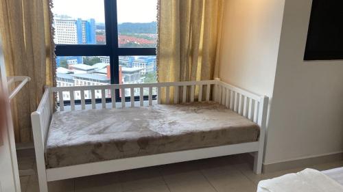 Ένα ή περισσότερα κρεβάτια σε δωμάτιο στο Homestay Bangi