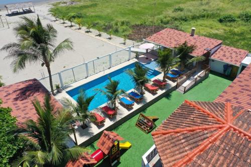 an aerial view of a resort with a swimming pool at casa munay in Canoa