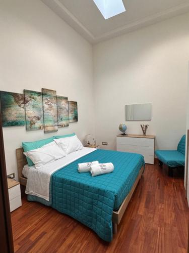 Una cama o camas en una habitación de Zara Palace - Ariosto