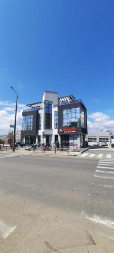 a large building on the side of a street at Zora in Blagoevgrad