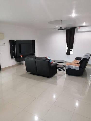 Χώρος καθιστικού στο Emerald Villa Homestay Dungun