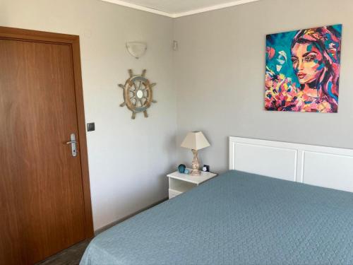 Ένα ή περισσότερα κρεβάτια σε δωμάτιο στο Nessebar panoramic apartment