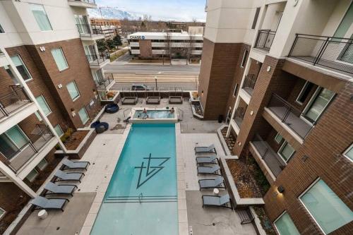an overhead view of a swimming pool in a apartment building at Urban Oasis in the Center of SLC in Salt Lake City