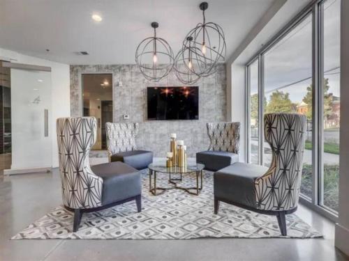 a living room with two chairs and a table at Urban Oasis in the Center of SLC in Salt Lake City