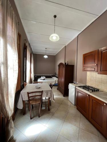 Kuchyň nebo kuchyňský kout v ubytování B&B Su Maimoni