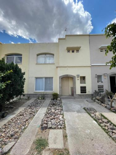 a large white house with a driveway at Casa en Condominio privado en renta por temporada de feria in Aguascalientes