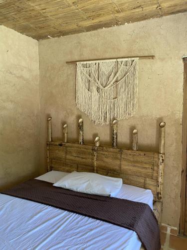 Cama o camas de una habitación en Hostal Dos Quebradas