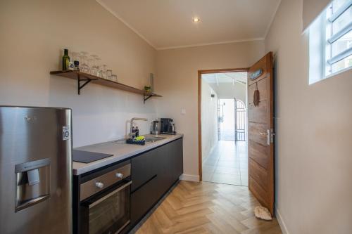 Kuchyň nebo kuchyňský kout v ubytování PUUR! Appartementen Curaçao