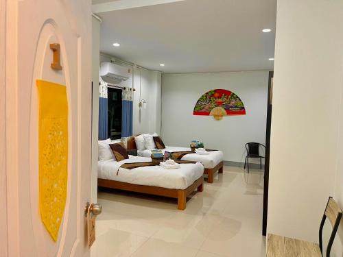 Coin salon dans l'établissement บ้านกาญจน์ เชียงราย Baan Kan Chiang Rai